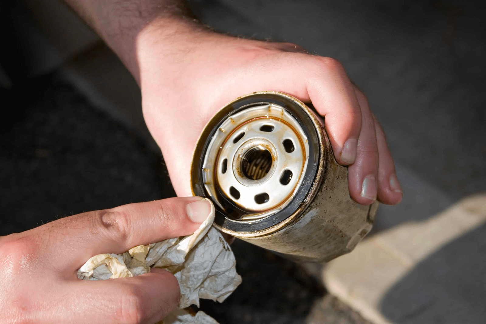 A faulty O-ring around the oil can cause a car to smell like gas